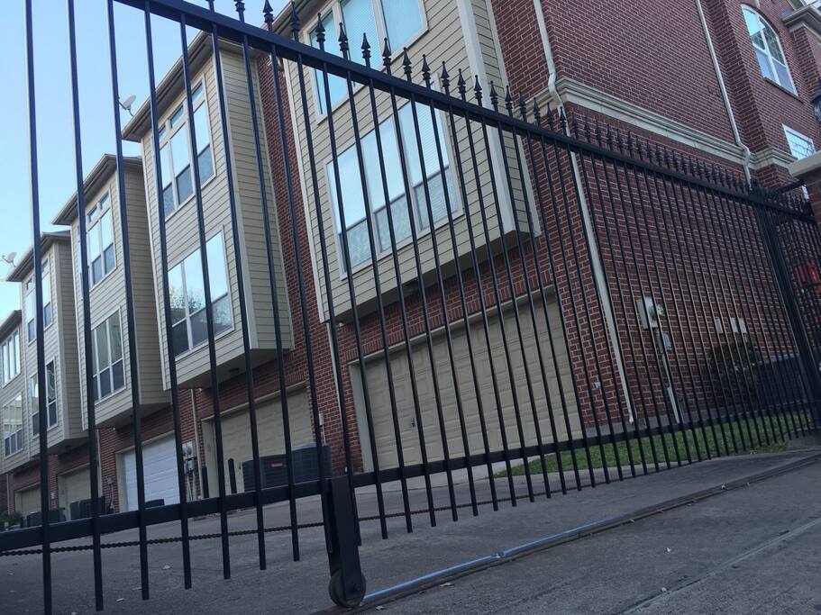 Gated entrance to private two-car garage.
