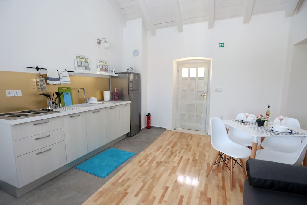 Kitchen with dining and living room
