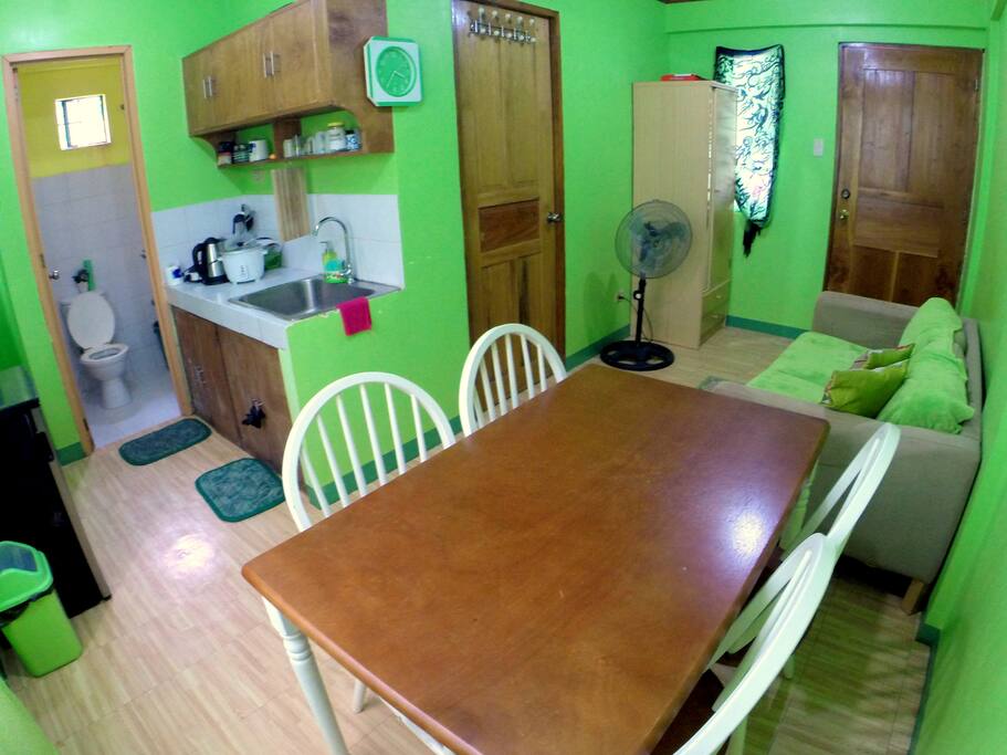 Upstairs apartment. Comfy lounge, dining table, kitchen area with small fridge/freezer