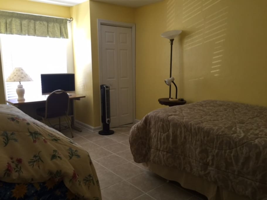 Spacious 2nd bedroom with 2 twin trundle beds + full size bed