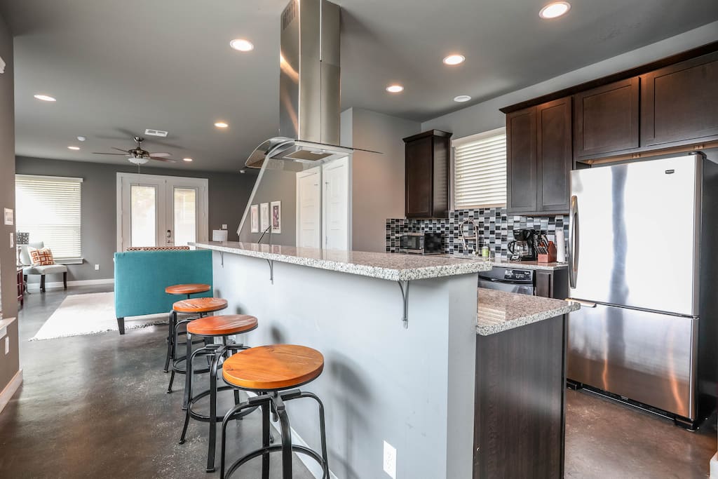 Your group will love our open floorplan - living, dining, kitchen and half bathroom on ground floor.