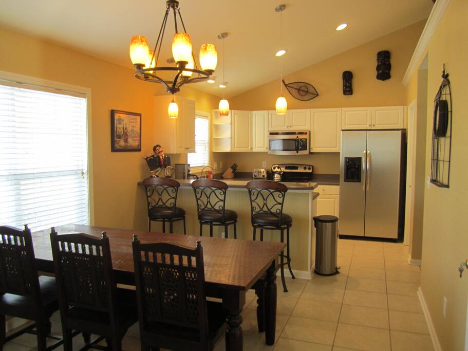 Open kitchen and dining room with ample seating
