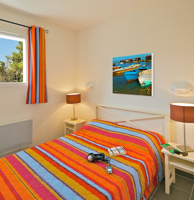 The bedroom features a cozy Double bed.