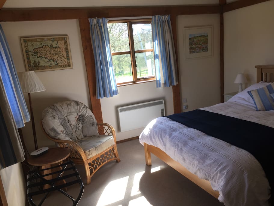 Large bedroom overlooking paddock