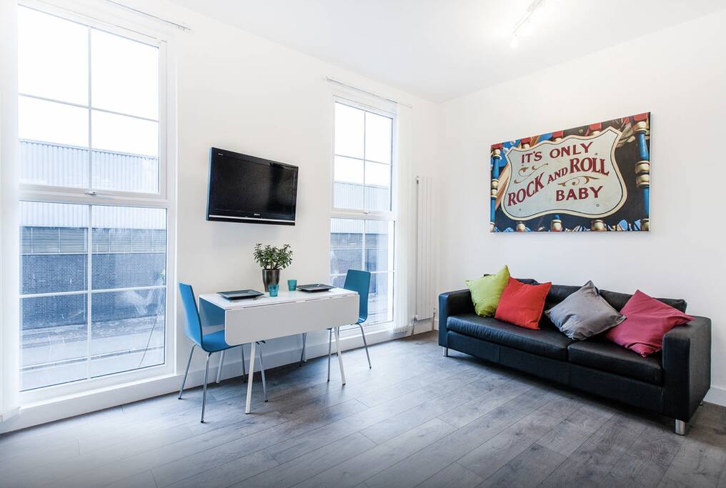 Dining area with 2 chairs and 2 stools