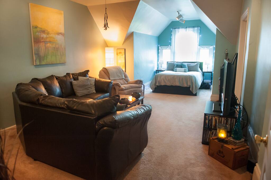 The bedroom is also a suite of sorts with an L shaped couch that can sleep a child or adult that doesn't mind a couch.