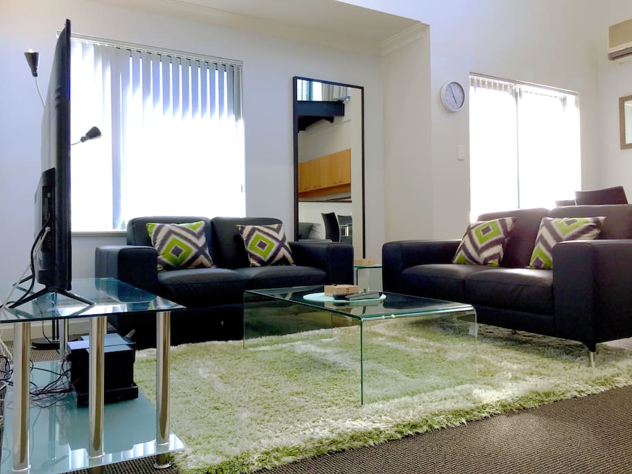 Lounge with large LED TV.