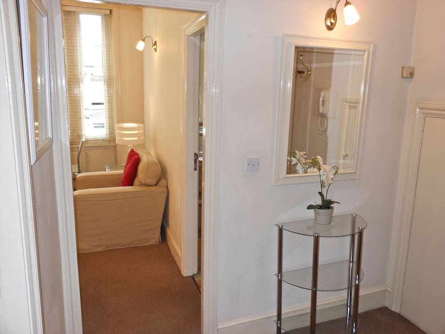 Entrance hall with storage cupboard