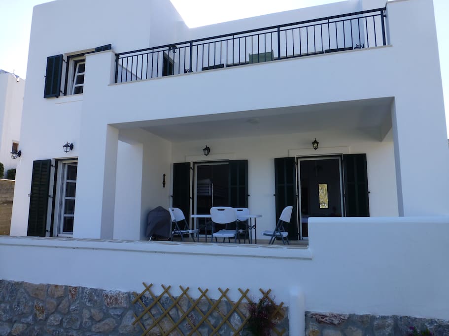 Downstairs apt veranda with furniture