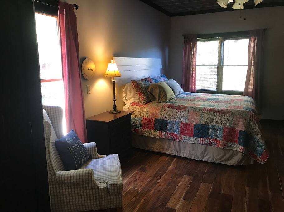 Master Bedroom-King Bed, walk-in closet, en suite bathroom with tile shower.