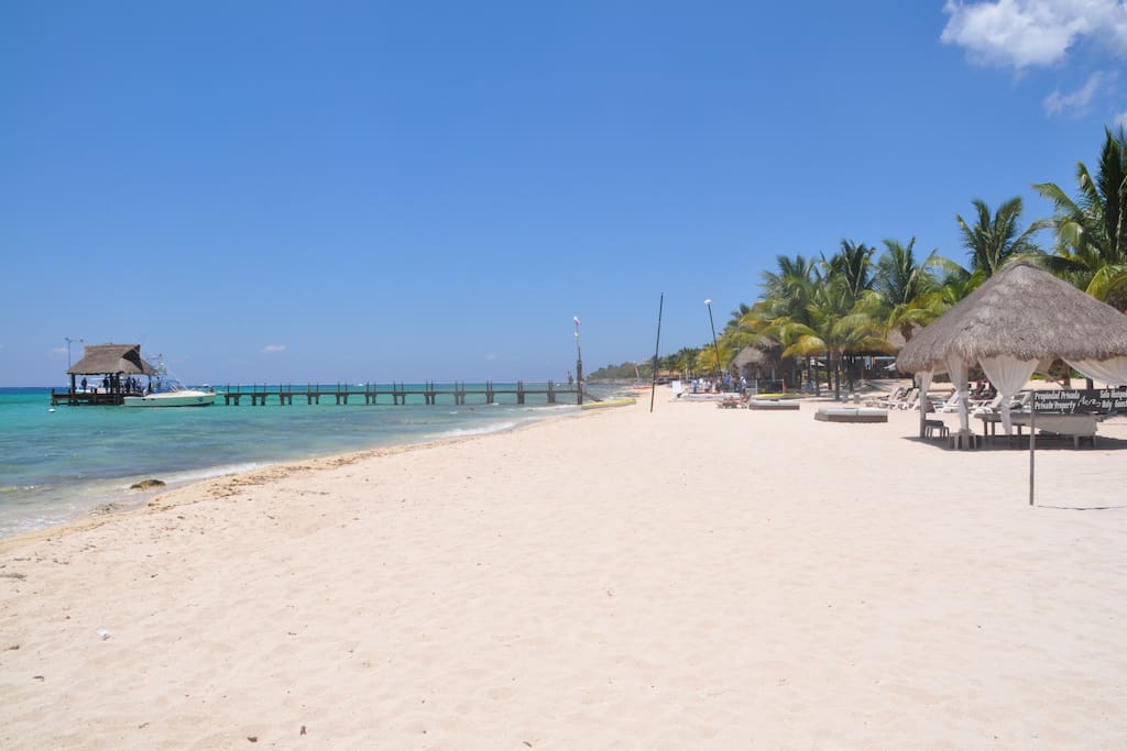Pristine endless beach, convenient boat pick up at dock next door