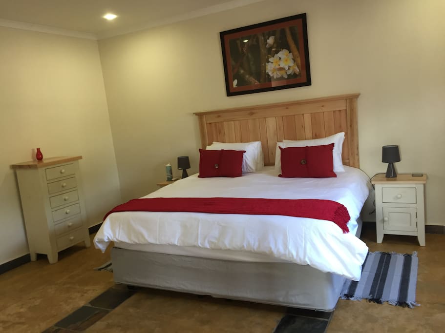 Ensuite bedroom with Kingsize bed and luxury bed linen