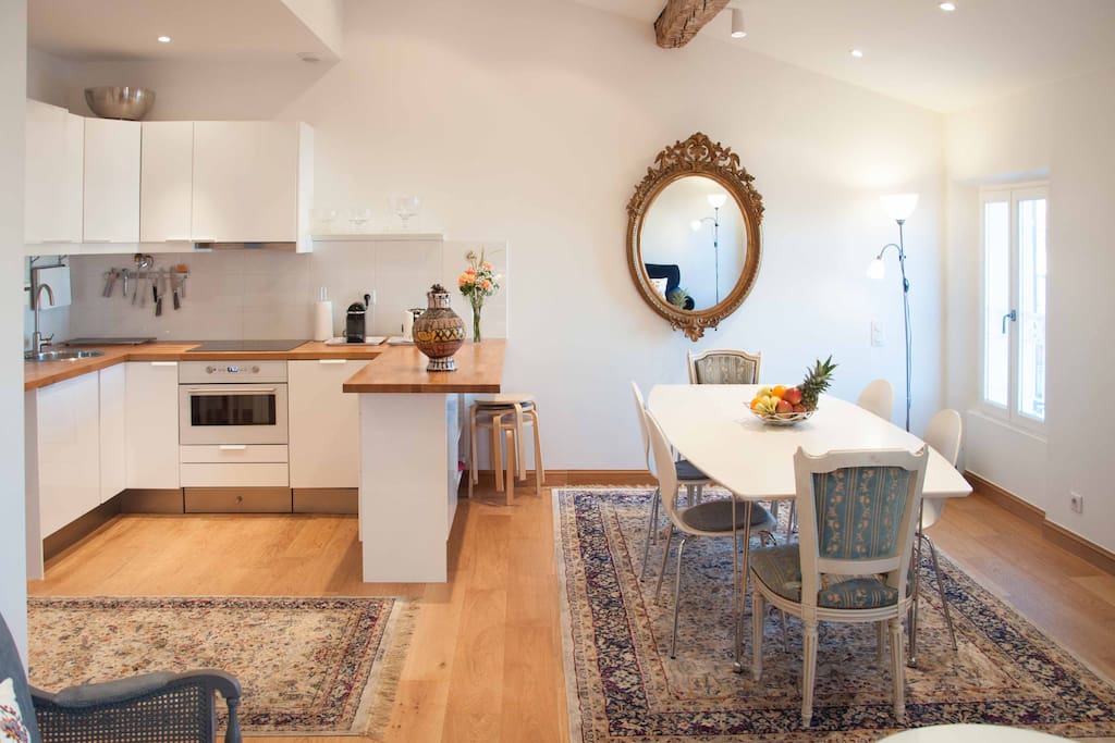 Open kitchen with dining for 12 people, table can be extended.