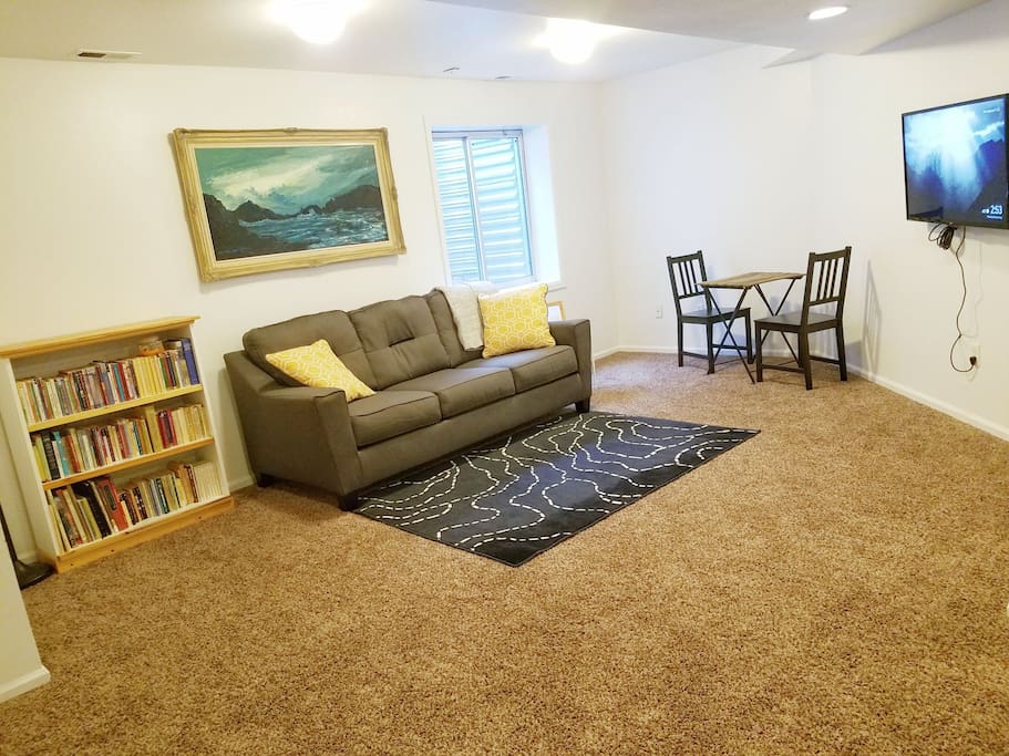 Fully finished basement has interior door creating a private space from the rest of the house.