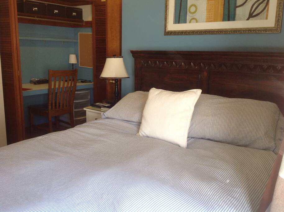 Carved wooden queen sized bed