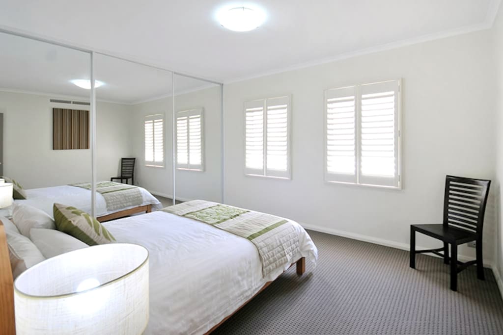 Queen bed with new, quality linen