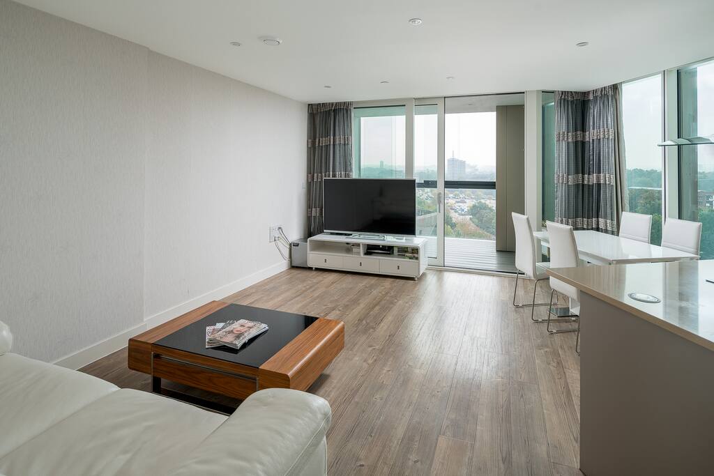 The large floor-to-ceiling windows make the room feel spacious and bright!