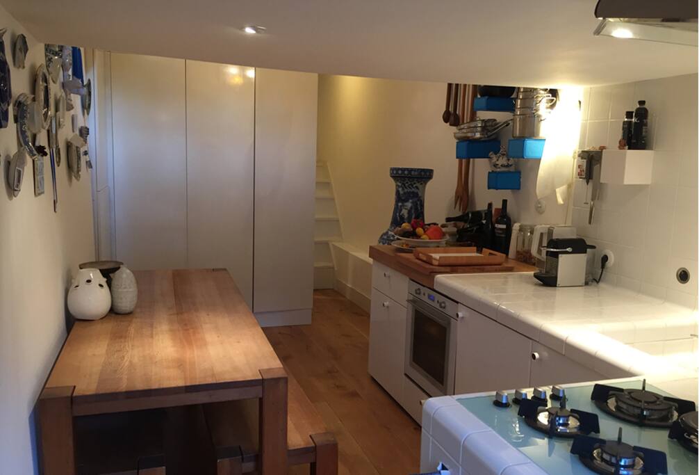 Kitchen view towards the stairs to go up to the Living