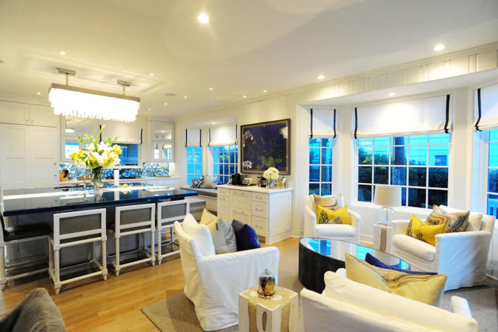 Kitchen view 2 showing coffee bar, island seating and sitting area