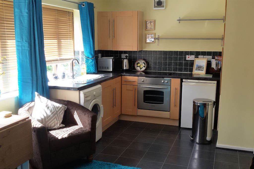 Fully equipped light, bright kitchen with south westerley views to city centre, canal and cathedral.