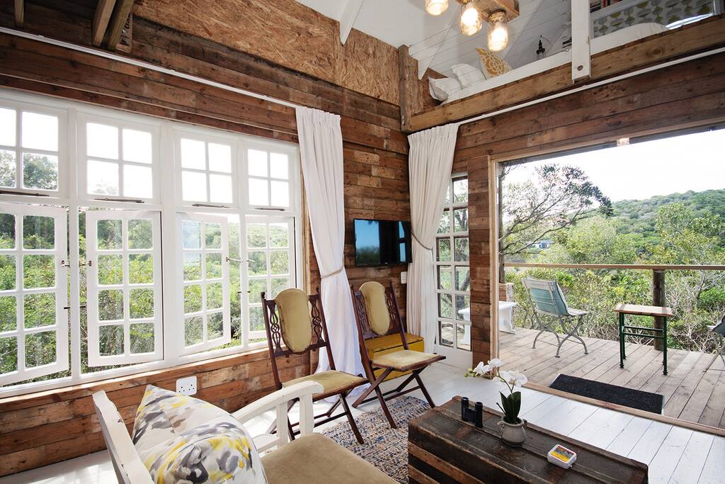 Comfortable lounge area overlooking the tree tops