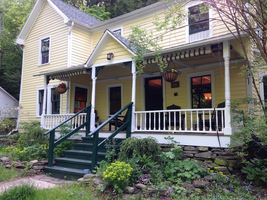 Our 1890s farmhouse is located on a state park road, with 4 acres of woods and creeks split on either side of a country road. The little white house you see at the left side of the photo is a cottage on the property that we use as a studio.