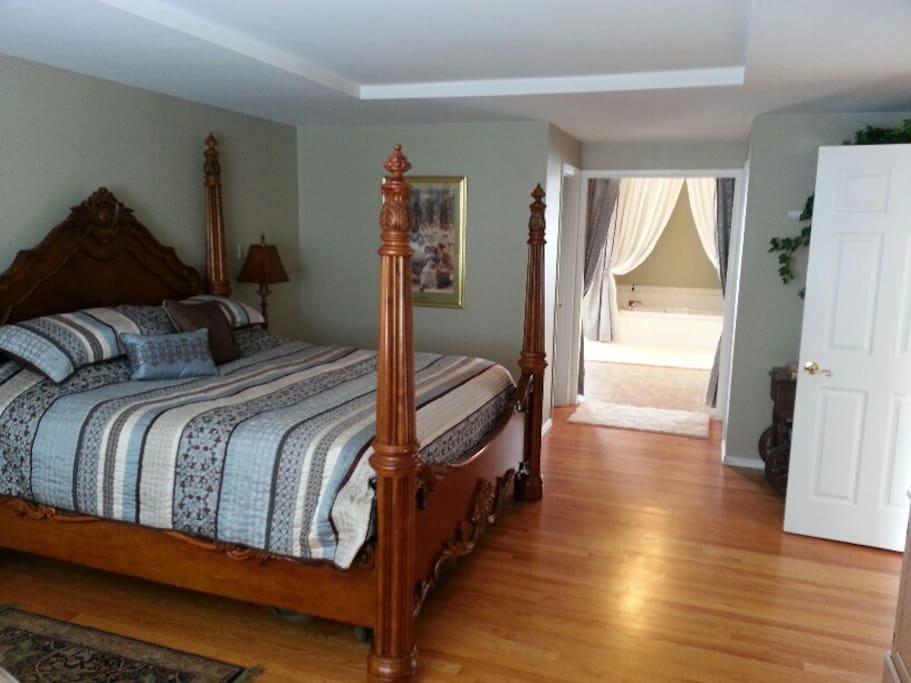 Master Bedroom and private luxury bath on main level.