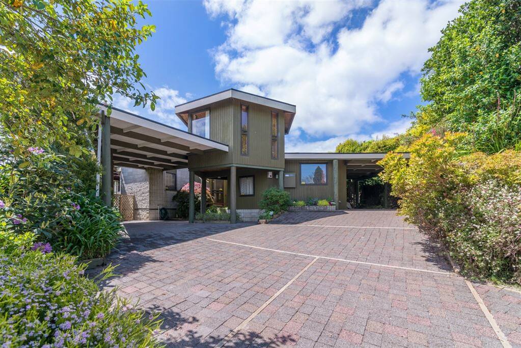 House front and parking area