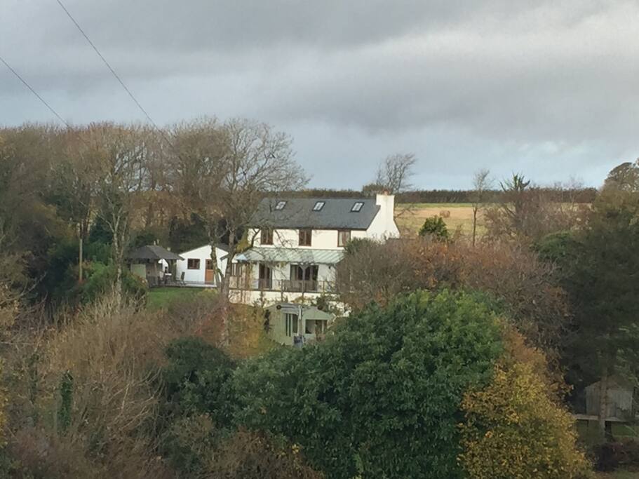 Our home, the lodge is hidden in the trees away from the house.