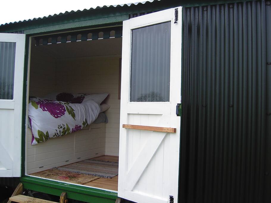 light and airy and fully made up bed for your arrival, with a memory foam mattress for those with bad backs :)