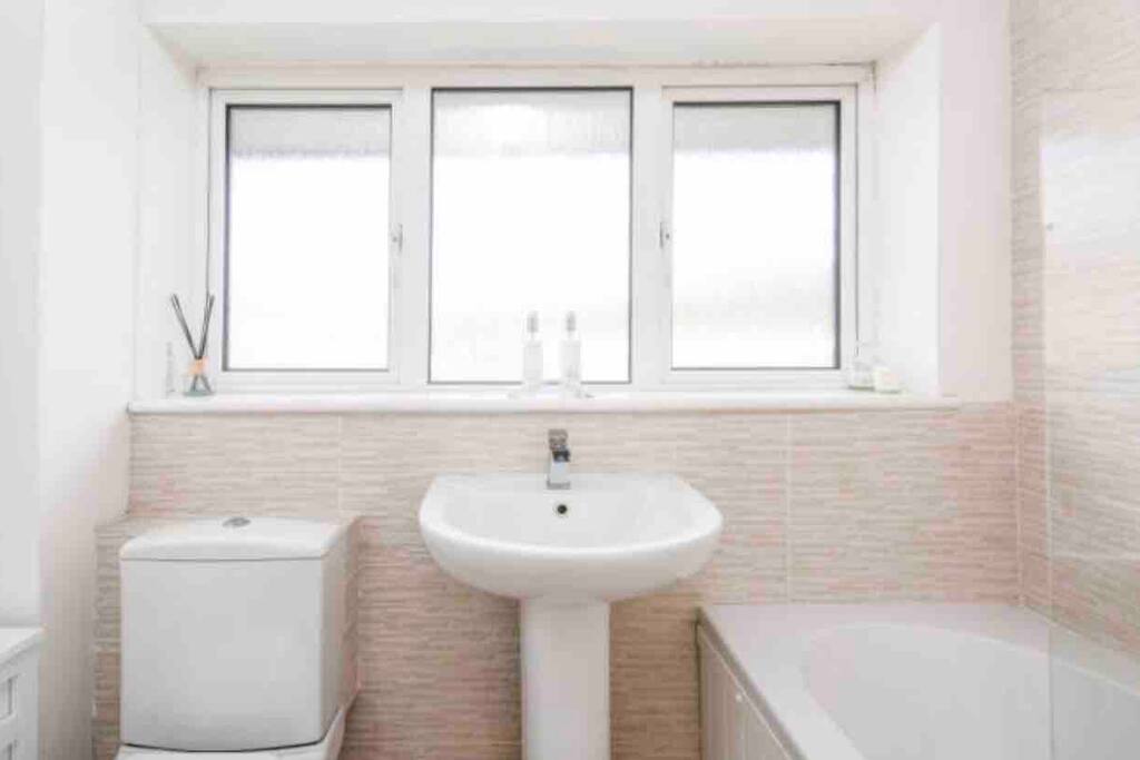 Private Bathroom with toilet, sink and shower