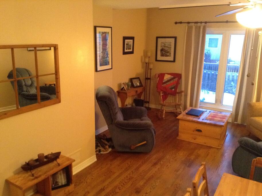 Bright but cozy conversation area and dining area