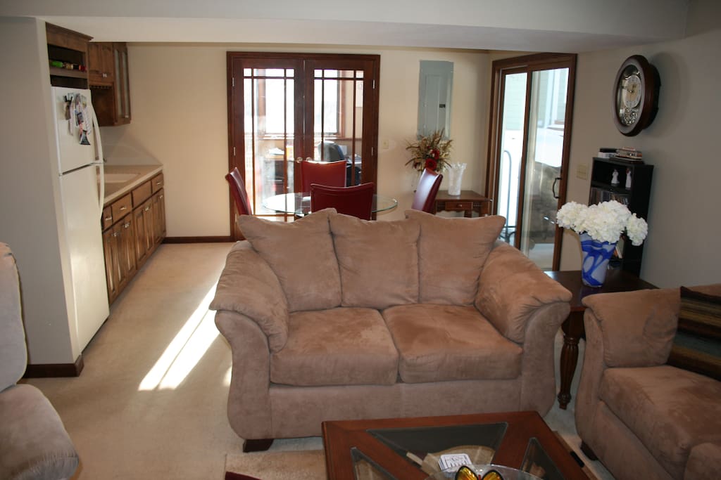 Family Room opens up to kitchenette w/Refrigerator, Wet Bar and Dining area