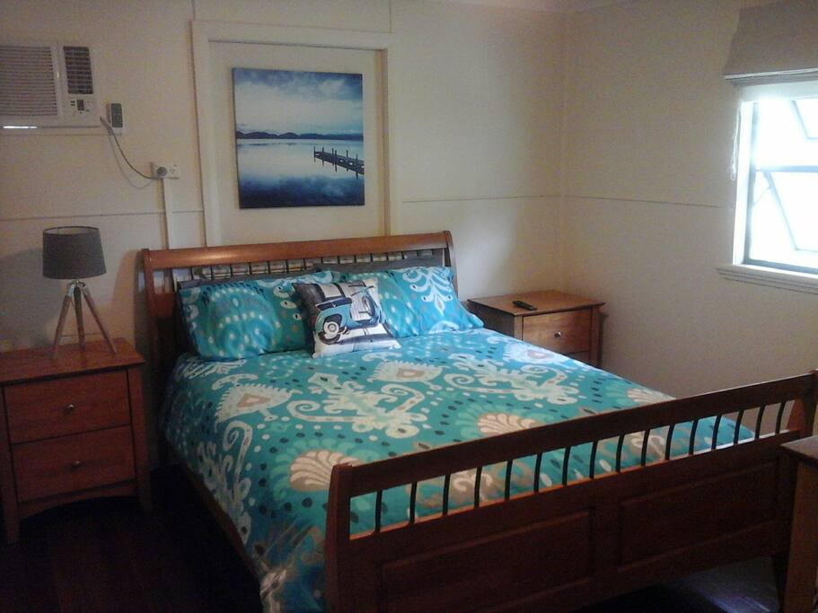 A quiet restful bedroom. The bed is like sleeping on a cloud