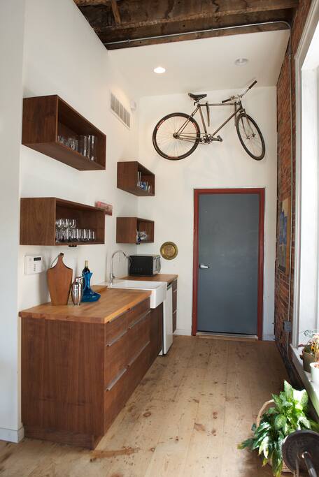 Apartment entry and bar.
