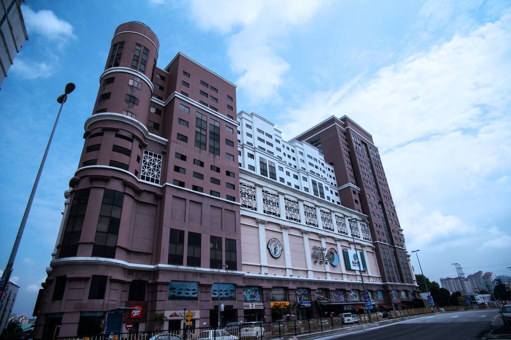Outside view of Apt building/ Shopping complex