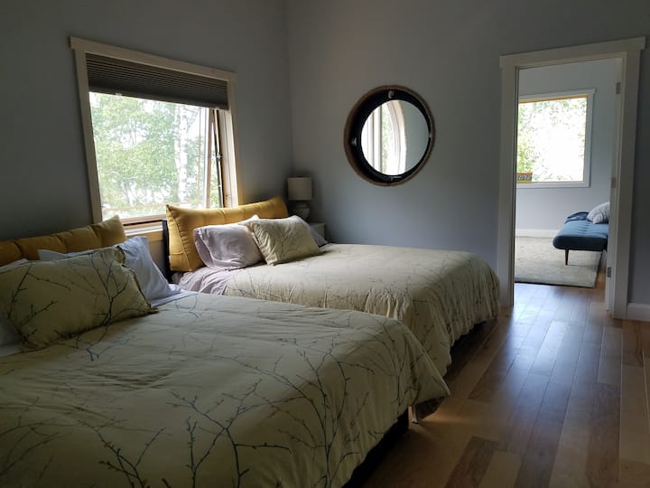 Upstairs bedroom with 2 queens connects to the loft