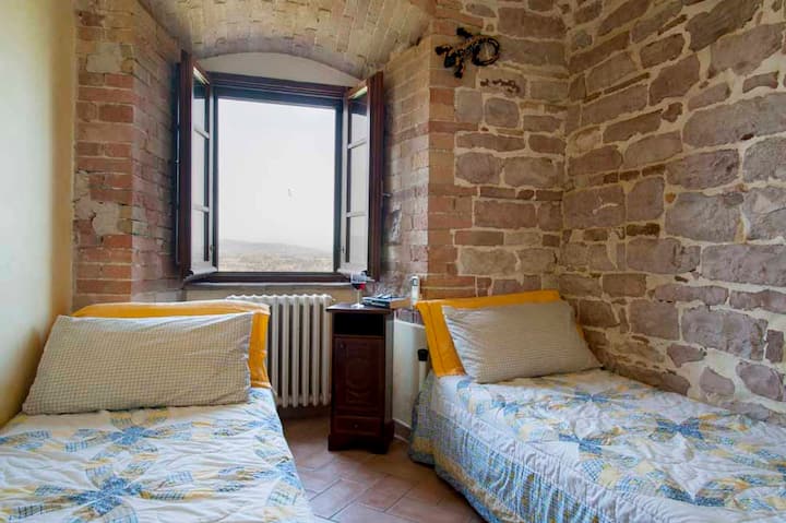 Third bedroom with twin size beds with a view. These beds can be rearranged into a Queen upon request.