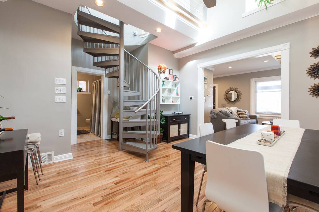 Great room with dining area. More skylights and fun architecture.