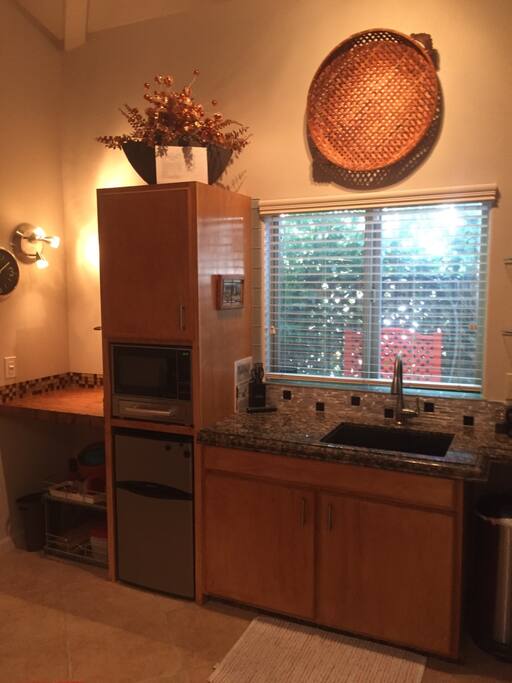 Custom kitchenette with all your entertaining needs taken care of.