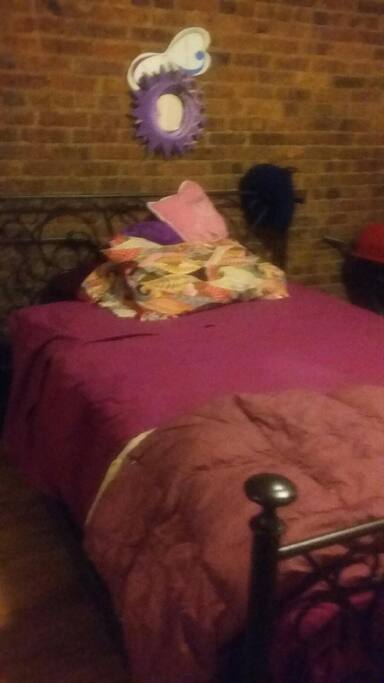 The bedroom is private with the backyard near, The bed is comfortable with a window overlooking the backyard that is cozy and quiet.
