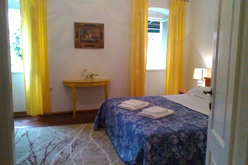 First Floor Master Bedroom over-looking the garden terrace.