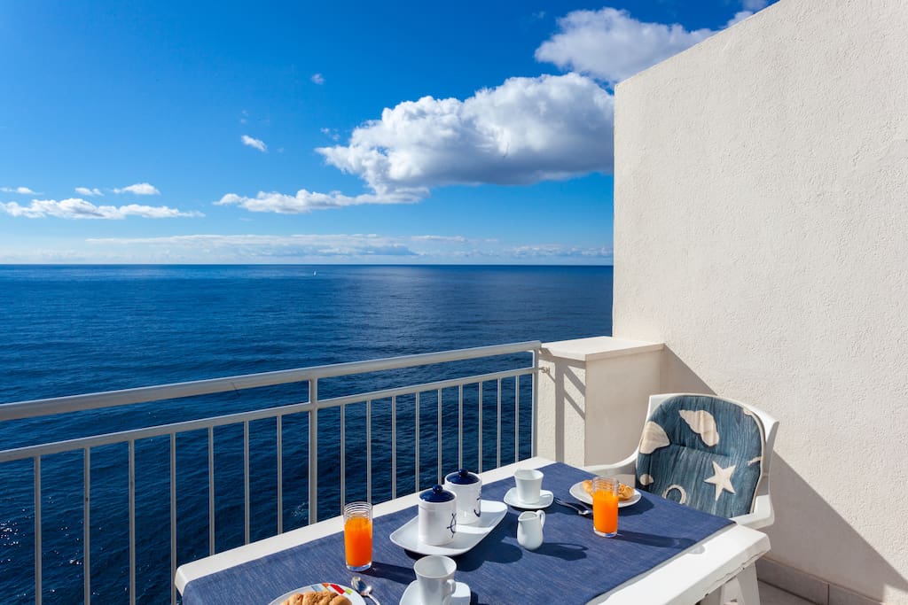 The secluded balcony with a stunning view of the Adriatic.