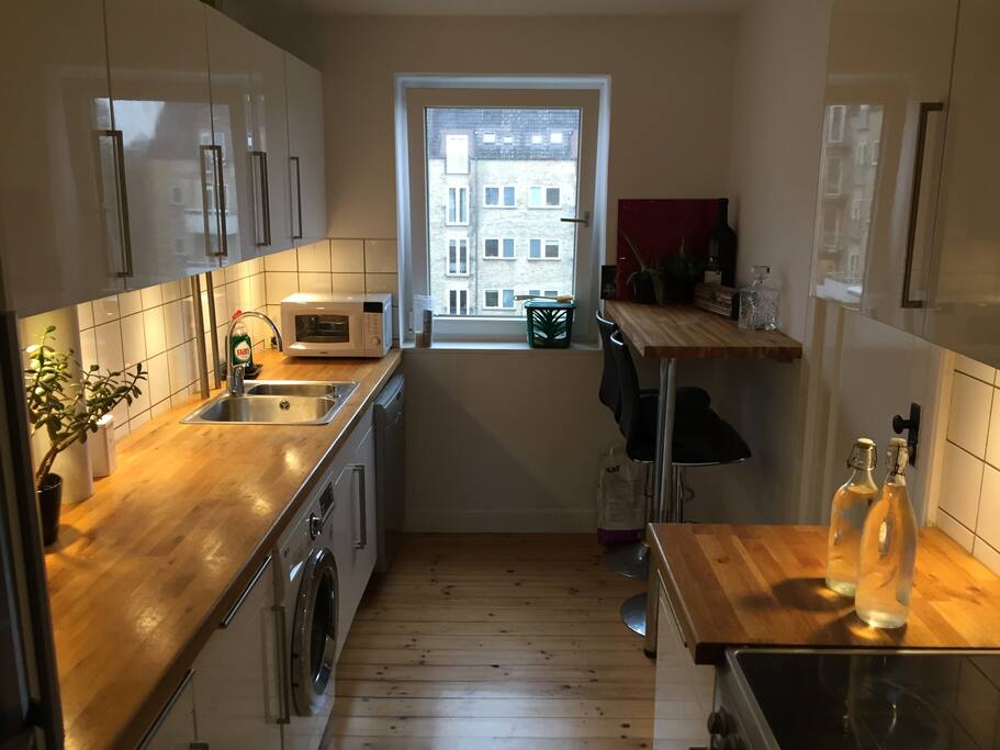 The kitchen. We have a washing machine, a dishwasher, an owen, a microwave, a toaster and naturally a fridge and a freezer - which you can all use freely.