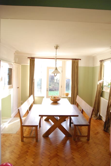 Dining Room with long table can seat 10 - easily 12 in a cosy way
