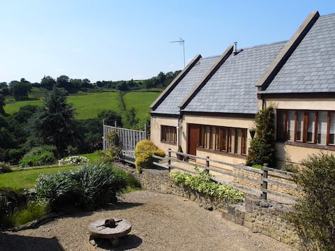 Stylish farm conversion with magnificent views