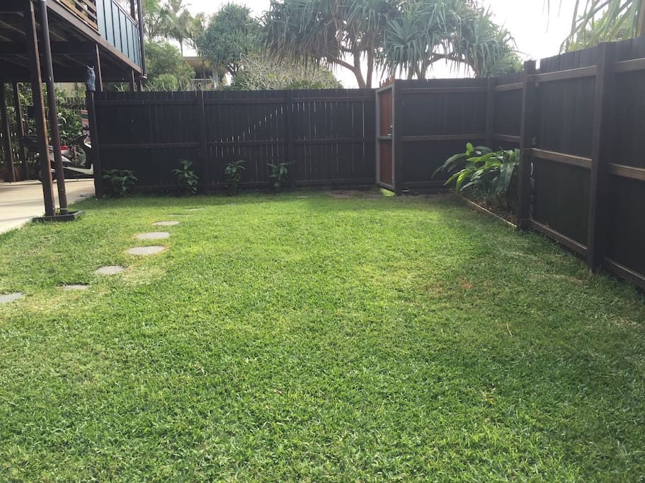 Private yard with secure entrance.