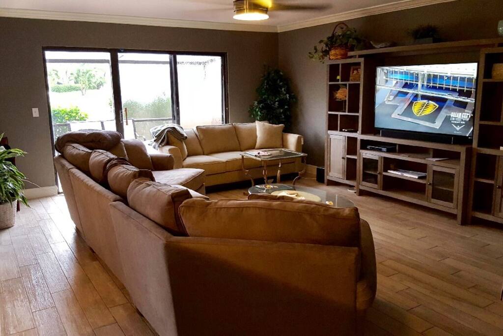 Large living room off of the kitchen with brand new furniture