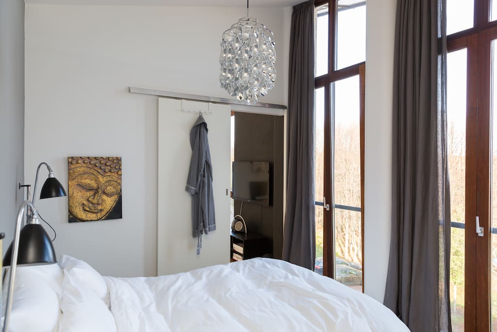 140 X 200 bed in the master bedroom on the second floor. Two french balconies, all doors open.