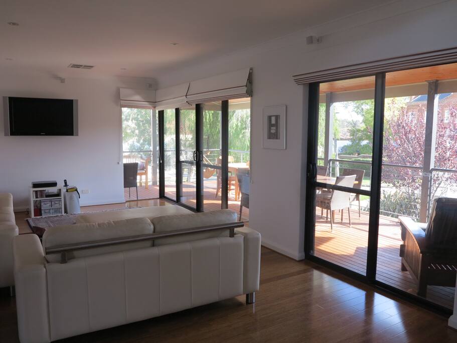 Lounge area opening out to large front balcony
